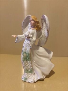 Decorative Ceramic Angel Holding a Dove Figurine